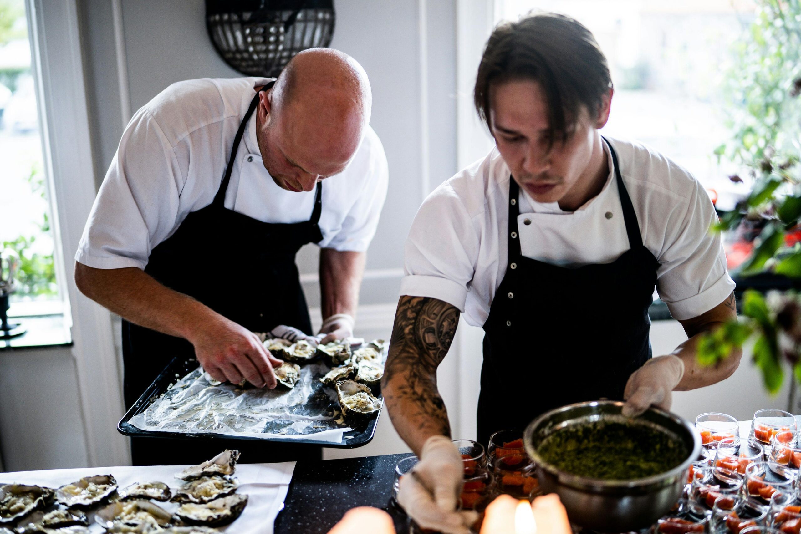 2 chef preparing a food